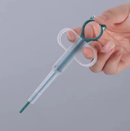 Distributeur de Médicament pour Chat et Chien